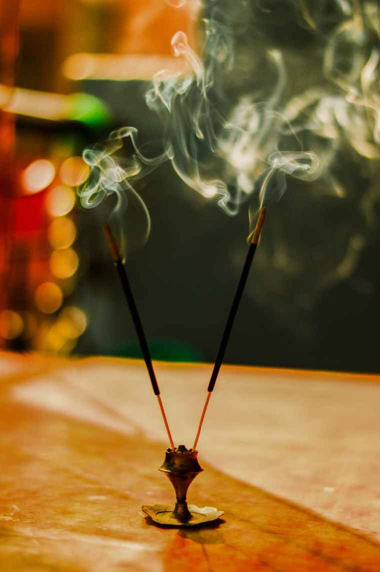 close up photograph of a lit incense